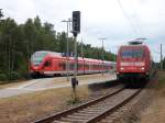 BR 429/83721/zugkreuzung-am-24juli-2010-in-prorawaehrend Zugkreuzung am 24.Juli 2010 in Prora.Whrend 101 056 mit dem IC Koblenz-Binz auf Ausfahrt warten mute,hatte 429 026 aus Binz nach Stralsund Einfahrt.