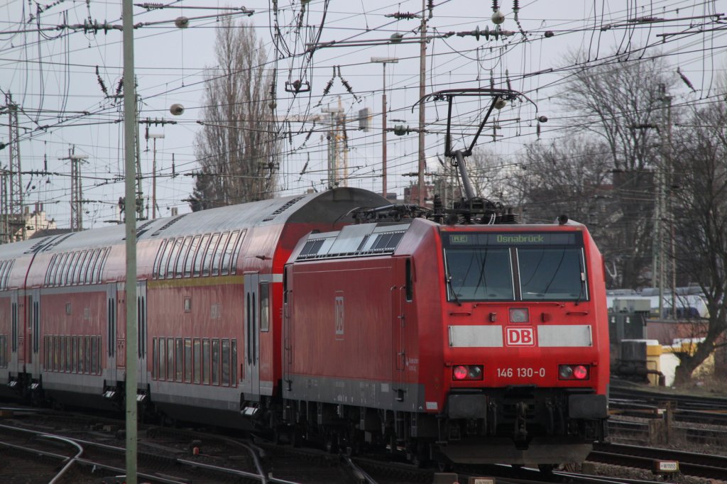 146 130-0 als RE 4469 von Bremerhaven-Lehe nach Osnabrck bei der Ausfahrt im Bremer Hbf.10.03.2012