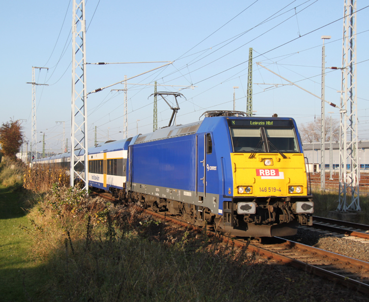 146 519-4 mit InterConnex 68904 von Warnemnde nach Leipzig Hbf kurz nach der Ausfahrt im Rostocker Hbf.01.11.2011