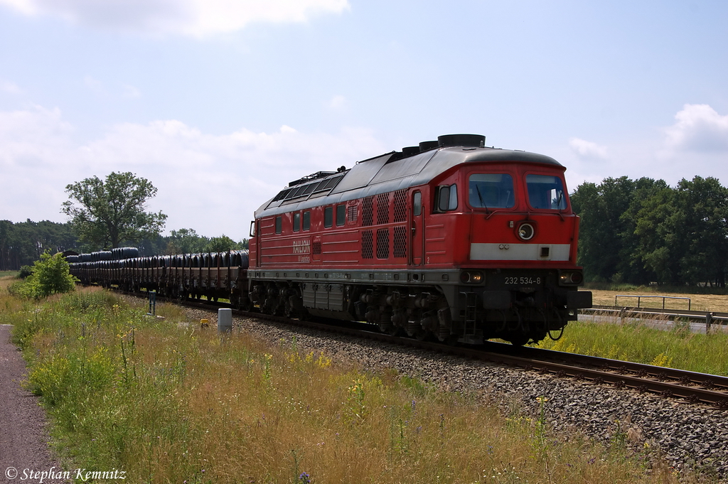 232 534-8 DB Schenker Rail Deutschland AG mit einem fast reinen Drahtrollenzug aus Brandenburg Altstadt bei Mgelin und fuhr in Richtung Rathenow weiter. 06.07.2012