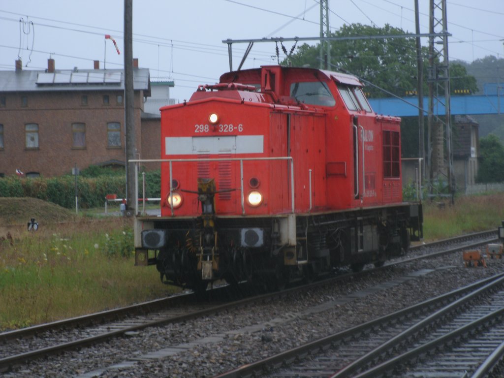 Auch 298 328 mute sich,am 21.Juli 2011,durch den strmenden Regen in Bergen/Rgen kmpfen.