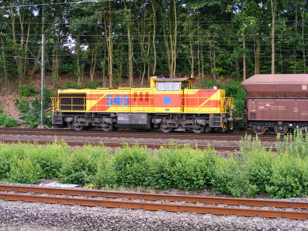 Eine MaK 1206 der Eisenbahn und Hfen ist am 23.07.2010 mit einem Gterzug in Dortmund-Marten-Sd unterwegs.