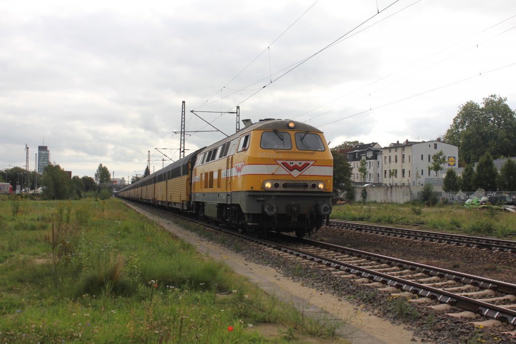 H.F. WIEBE V160 ( 216 032-3 ) mit Autozug auf dem Weg nach Cuxhaven am 16.09.2011 in Hamburg Unterelbe.