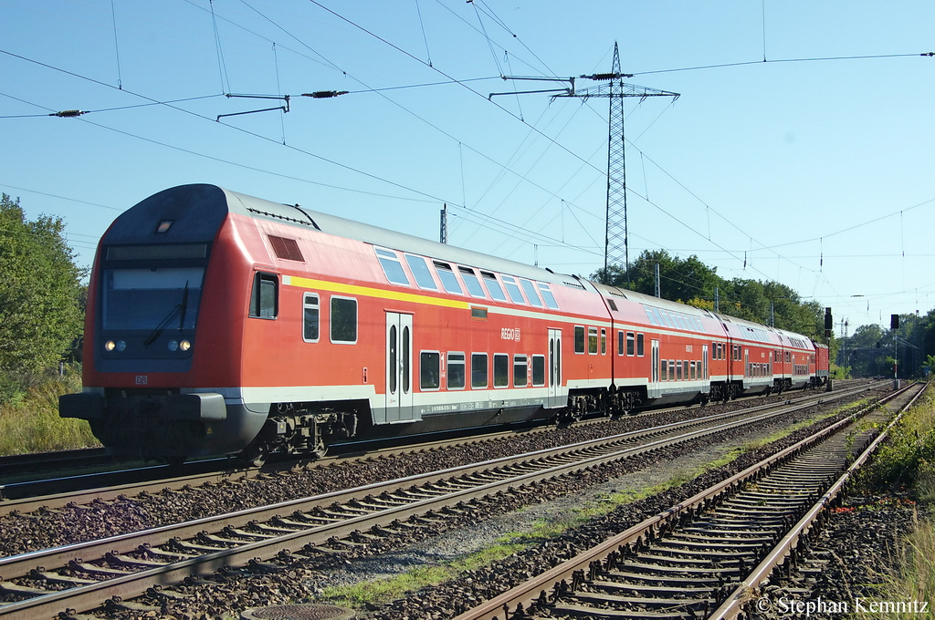 RB21 (RB 18670) von Potsdam Hbf nach Wustermark in Satzkorn. Geschoben von der 143 360. 01.10.2011