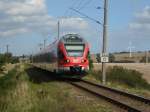 BR 429 Von Sassnitz nach Lietzow war am 02.September 2009 dieser Flirt bei Borchtitz unterwegs.