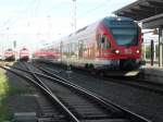 BR 429 Treffen im Rostocker Hbf links stehen 2x Rostocker S-Bahnz�ge und recht&acute;s auf Gleis 3 hat RE 33218 von Sassnitz nach Rostock Hbf einfahrt.(05.06.10) 
