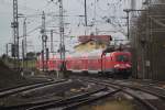 berlin-und-brandenburg 182 009-1 mit RE 37379 von Wismar nach Cottbus bei der Ausfahrt im Bahnhof Bad Kleinen.19.12.2011