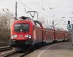 berlin-und-brandenburg ex Railion 182 012-5 mit RE 37376 von Cottbus nach Wismar bei der Einfahrt im Bahnhof Bad Kleinen.28.12.2011