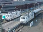 br-109-110-111-13-115 Von der Fussg�ngerbr�cke und durch die Fensterscheibe am 11.April 2010 in Mukran aufgenommen: links GVG 109-2 und GVG 109-3.