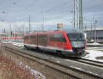 BR 642 RE 33174 von Tessin Richtung Wismar kurz vor der Einfahrt im Rostocker Hbf.im Hintergrund zusehen die Rostocker Skyline und 2x628er.(07.03.10)