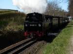 BR99 99 4801 verlie� am 18.April 2009 mit ihren Personenzug Putbus-G�hren den Kreuzungsbahnhof Binz LB.