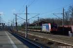 dampfloksdiesellokse-lokstriebwagen 482 042-9 HSL Logistik GmbH mit leerem Holzzug in Rathenow Richtung Wustermark unterwegs. 15.01.2012
