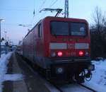 114 020-1 mit S1 von Warnemnde Richtung Rostock Hbf kurz nach der Ankunft im Bahnhof Rostock-Bramow.(05.01.2011)