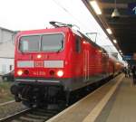 Endlich ist sie wieder aus Dessau zurck 143 250-9 steht mit S1 von Rostock Hbf nach Warnemnde kurz vor der ausfahrt im Rostocker Hbf.(12.04.2011)