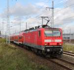 Na nu 143 564-3 als S1? von Gstrow nach Warnemnde bei der Einfahrt im Rostocker Hbf.19.10.2011