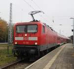 Rostock-Spezial/164948/112-190-4-mit-warnemuende-express-als-db-dienstfahrt 112 190-4 mit Warnemnde-Express als DB-Dienstfahrt von Warnemnde nach Rostock Hbf bei der ausfahrt im Bahnhof Warnemnde.29.10.2011