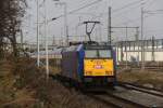 146 519-4 mit X68903 von Leipzig Hbf nach Warnemnde bei der Einfahrt im Rostocker Hbf.11.12.2011