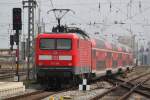 112 106-0 mit RE 4363 von Rostock Hbf nach Lutherstadt Wittenberg bei der Ausfahrt im Rostocker Hbf.20.04.2012