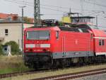 143 889-4 mit S2 Gstrow-Warnemnde bei der Einfahrt im Rostocker Hbf.13.07.2012