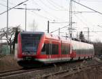 DB-Regio 646er und Hamster fuhren am 14.03.2014 von Rostock Hbf nach Berlin bei der Ausfahrt im Rostocker Hbf