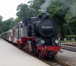 99 2323-6 mit MBB14625 von Khlungsborn West nach Bad Doberan bei der Einfahrt im Bahnhof Bad Doberan.30.06.2013