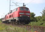 BR 218/664360/218-473-7-mit-sonderzug-der-hel 218 473-7 mit Sonderzug der HEL „Rügen-Express“ von Neumünster nach Binz Am Morgen des 13.07.2019 in der Güterumfahrung in Höhe Rostock Hbf.