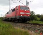 111 020-4(DB Regio NRW GmbH)mit AKE-Sonderzug 98 von Koblenz Hbf nach Ostseebad Binz bei der Durchfahrt in der Gterumgehung Hhe Rostock Hbf.21.06.2015