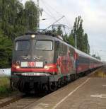 115 509-2 mit Sonderzug 2680 von Warnemnde nach Berlin-Lichtenberg bei der Durchfahrt im S-Bahnhof Rostock-Holbeinplatz.11.08.2013
