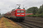 112 118 mit RE 18490 von Berlin Hbf(tief)nach Warnemünde bei der Durchfahrt in Rostock-Bramow.12.08.2017