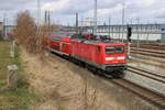 112 165 mit RE 4310(Rostock-Hamburg)bei der Ausfahrt im Rostocker Hbf.12.03.2021