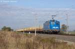 BR 140/299706/140-038-0-press-140-851-7-mit 140 038-0 PRESS (140 851-7) mit einem leeren Holzzug in Vietznitz und fuhr in Richtung Nauen weiter. 14.10.2013