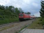 112 104-5 pendelte,am 17.Juni 2012,zwischen Sassnitz/Binz und Lietzow.Hier schob Sie den RE 13170 Sassnitz-Lietzow aus Sagard.