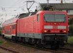 143 952-0 mit S 2 von Gstrow nach Warnemnde bei der Einfahrt im Bahnhof Warnemnde,fuhr spter als S1 zurck.19.10.2013