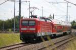 112 114 mit IRE18539 von Rostock Hbf nach Berlin Hbf(tief) bei der Ausfahrt im Rostocker Hbf.06.06.2014