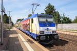 146 541-8  open Festival Uelzen  metronom Eisenbahngesellschaft mbH mit dem RE3 (ME 82122) von Uelzen nach Hamburg Hbf, bei der Ausfahrt aus Bienenbüttel. 18.07.2017