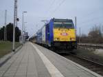 146 519-4 verlsst mit InterConnex 80004 von Warnemnde nach Leipzig Hbf den Bahnhof Warnemnde.(30.03.10)