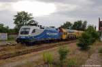 1116 912-5 (182 912-6) MWB steht mit Bauzug in Rathenow abgestellt.