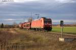 BR 185/313172/185-157-5-db-schenker-rail-deutschland 185 157-5 DB Schenker Rail Deutschland AG kam mit einem gemischten Güterzug aus Richtung Salzwedel komment durch Stendal(Wahrburg). Sie fuhr in Richtung Rathenow weiter. 27.12.2013