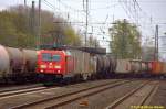 BR 185/422750/185-363-mit-gueterzug-aus-maschen 185 363 mit Güterzug aus Maschen bei EInfahrt in Stade Gbf. am 23.04.2015