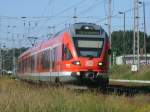 Schon die Streckenhchstgeschwindigkeit von 90 km/h hatte der 429 028, beim Verlassen von Bergen/Rgen,am 27.Juni 2011,drauf.