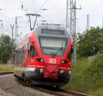 BR 429/274451/429-526-7-als-re-13008-von 429 526-7 als RE 13008 von Sassnitz nach Rostock Hbf bei der Einfahrt im Rostocker Hbf.16.06.2013