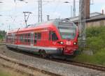 429 526-7 als RE 13011 von Rostock Hbf nach Sassnitz bei der Ausfahrt im Rostocker Hbf.16.06.2013