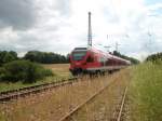 429 030 von Sassnitz nach Lietzow im zugewachsenen Bahnhof Sagard am 26.Juli 2010.