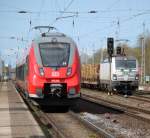 442 843-9 als S1 von Rostock Hbf nach Warnemnde bei der Ausfahrt im Haltepunkt Rostock-Bramow neben an stand die SETG-Vectron 193 831-5 Aufgenommen am 17.04.2015