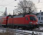 182 009-1 schiebt ihren RE 37385 von Wismar nach Cottbus bei der Ausfahrt im Bahnhof Wismar.10.02.2012