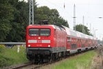 112 165 mit RE 18491(Warnemnde-Berlin Hbf(tief)bei der Durchfahrt am Abend des 13.08.2016 in Rostock-Bramow.