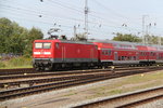 112 165 mit RE 18490(Berlin-Warnemnde)bei der Einfahrt im Rostocker Hbf.28.08.2016