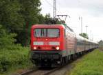 Die Rostocker 114 040-9 mit RE 13280 von Warnemnde nach Berlin-Lichtenberg bei der Durchfahrt in Rostock-Bramow.29.05.2014