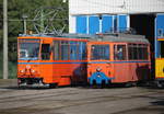rostock/577574/ckd-tatra-wagen-t6a2-552-und CKD Tatra Wagen T6A2 552 und Lowa-Wagen 554 vor dem Depot 12 in Rostock-Marienehe.23.09.2017
