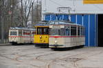 rostock/539843/wagen-46156wagen-26-und-gelenktriebwagen-des Wagen 46+156,Wagen 26 und Gelenktriebwagen des Typs G4(Wagen 1)waren am Nachmittag vor dem Depot 12 in Rostock-Marienehe.11.02.2017